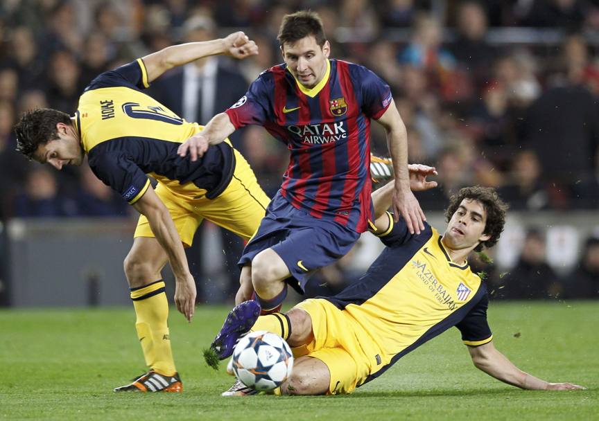 Koke ferma Messi con le cattive. Reuters